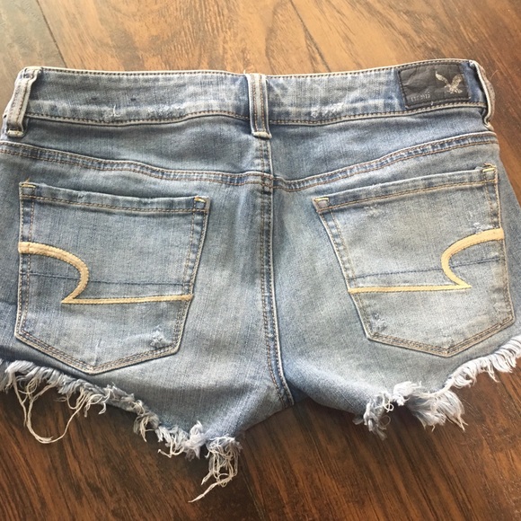 American Eagle exposed pocket distressed shortie super stretch denim shorts - Picture 3 of 7